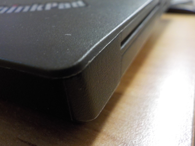 Quite sharp this side of the palm-rest. Right side of the palm rest, with bits of plastic protruding due to the injection process.